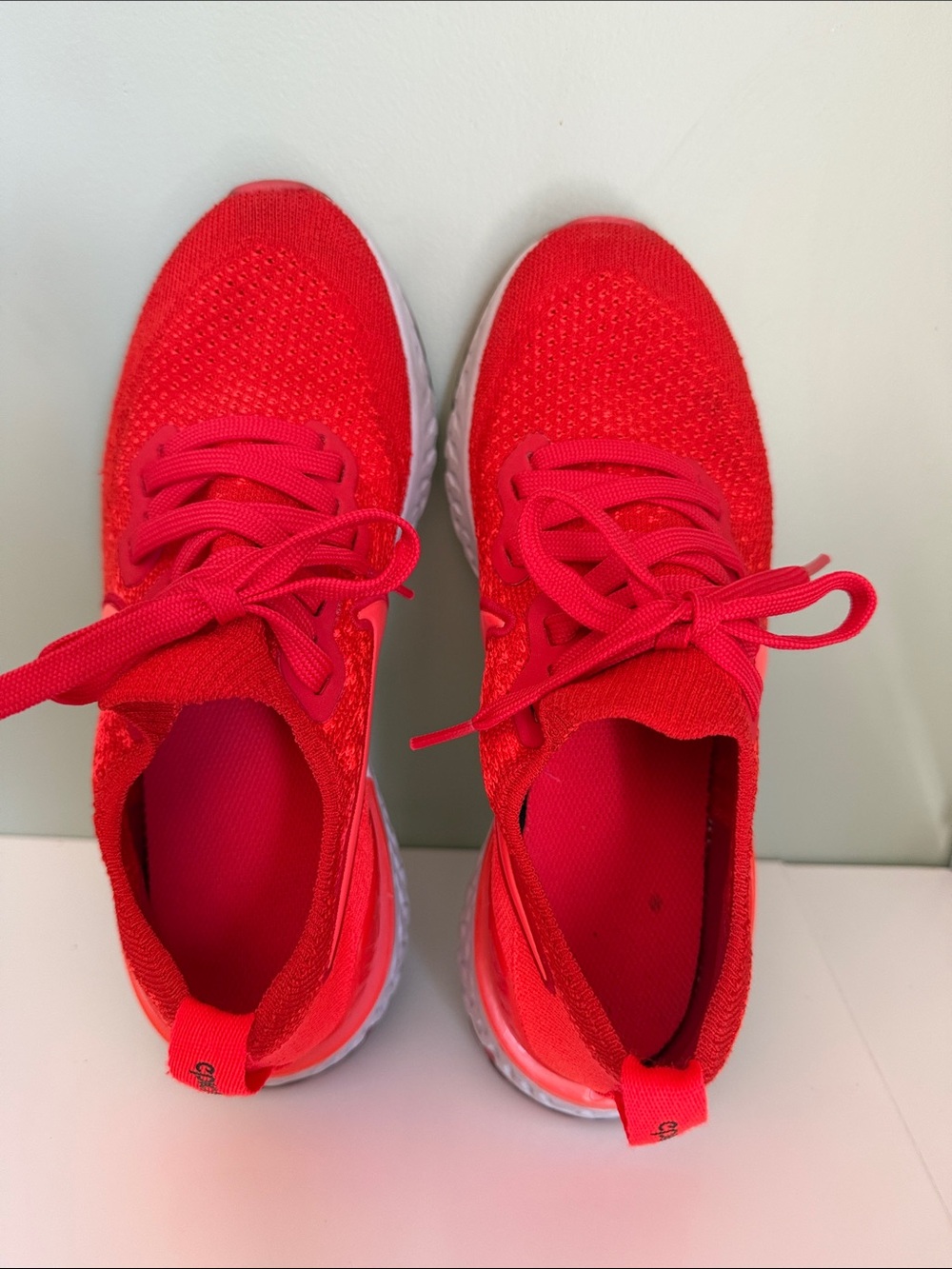 Nike orange slip on athletic shoes...youth.
